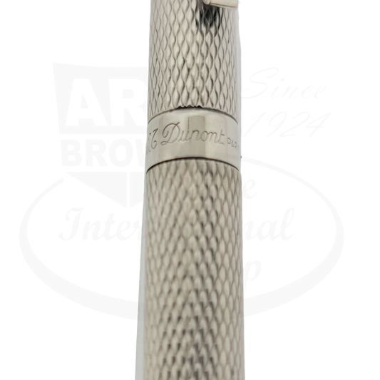 S.T. Dupont Classique silver ballpoint pen featuring textured barley grain pattern on brass body with engraved brand name on central band