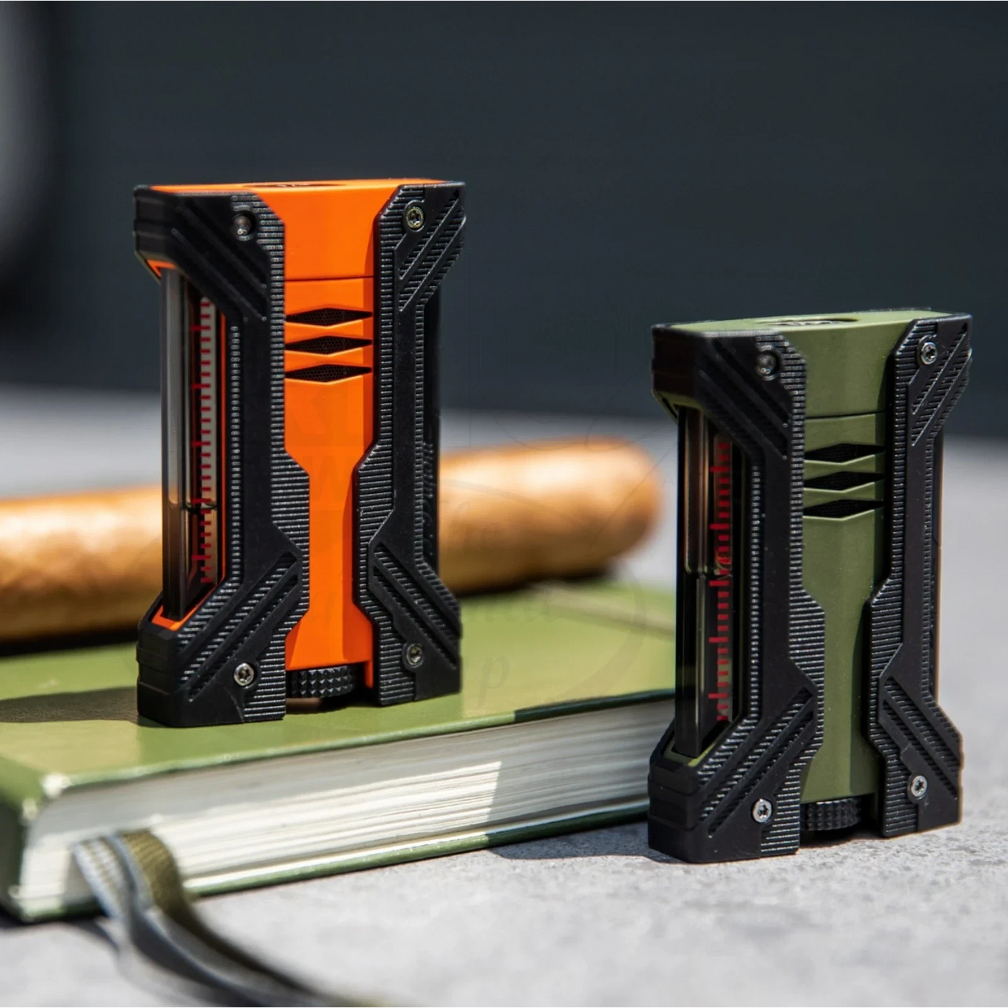 S.T. Dupont Defi XXtreme 021612 torch flame lighter with orange and black body, textured grip accents close-up