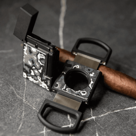 S.T. Dupont Carbon Fiber Ligne 2 Lighter and matching cutter, Dark Storm motif in gray, white and matte black.