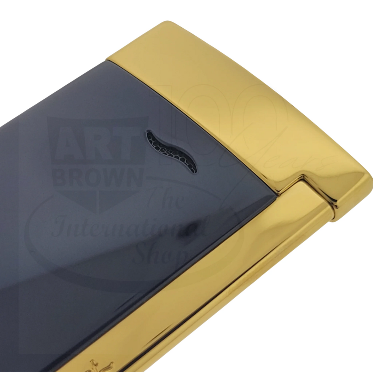 Closeup view of S.T. Dupont Slim 7 torch flame lighter with blue lacquer and polished gold top edge, sleek rectangular shape