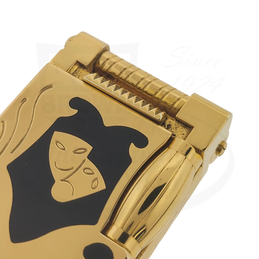ST Dupont Teatro pocket lighter in gold-plated brass with black lacquer theatrical mask design, vintage limited edition 0011580