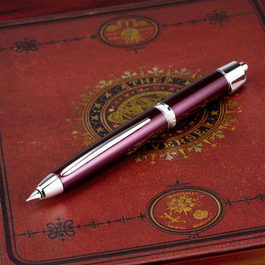 Pilot Vanishing Point broad fountain pen in burgundy lacquer with rhodium accents