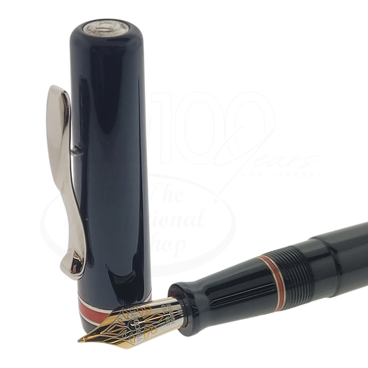 Preowned Visconti Voyager Midnight Coral Fountain Pen close-up of nib and cap with coral accent, gallery position 1 square image