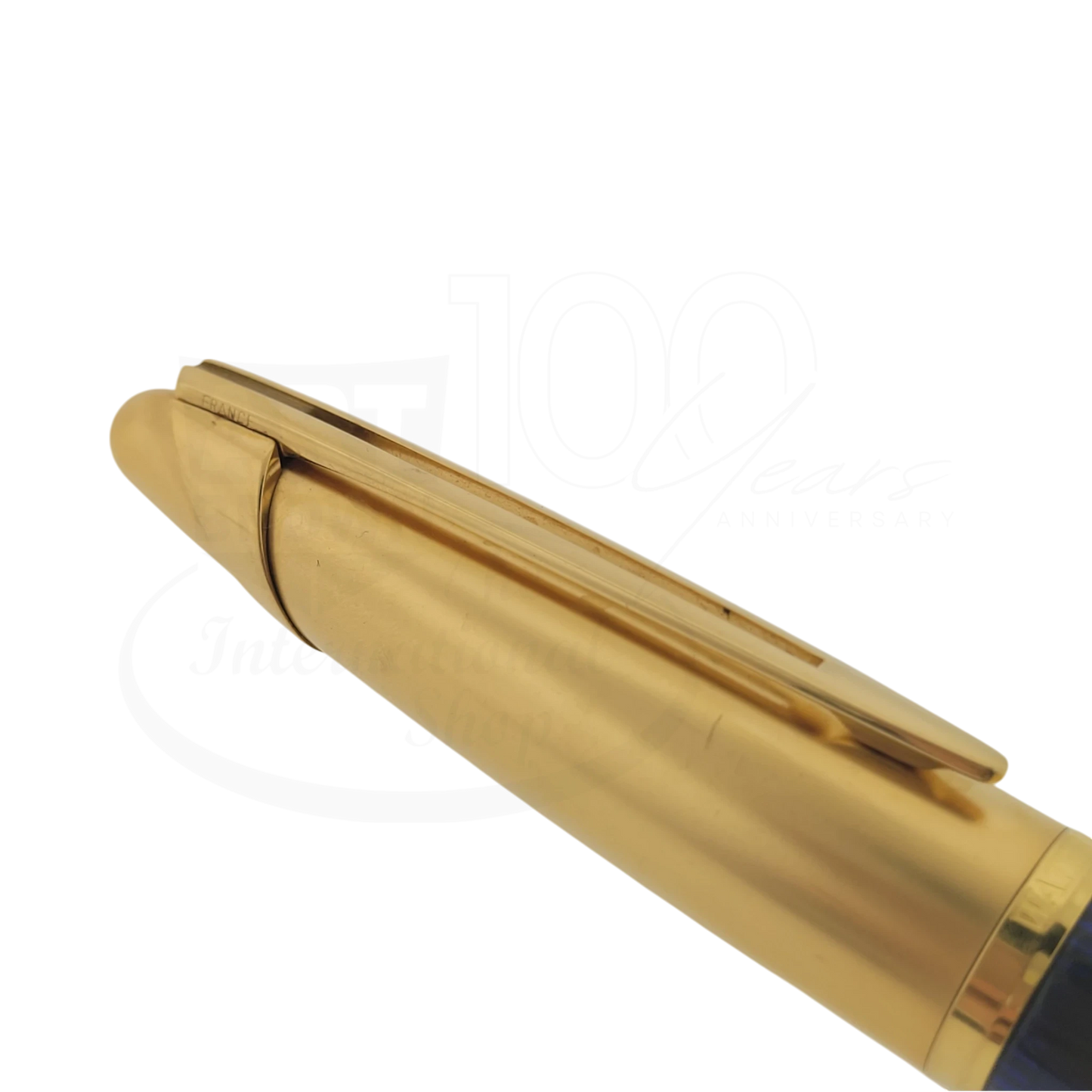 Waterman Edson Sapphire ballpoint pen with 18K gold clip and deep blue lacquer barrel close-up view