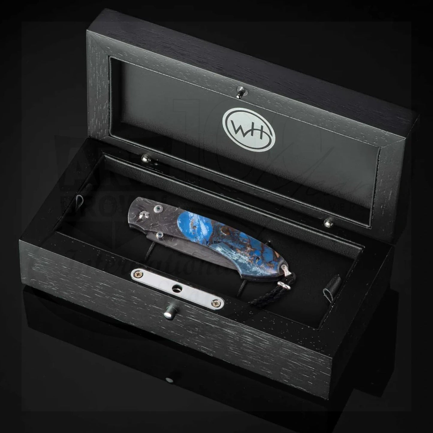 William Henry B12 Blue Fusion Spearpoint folding knife with blue resin and Damascus steel handle in black presentation box