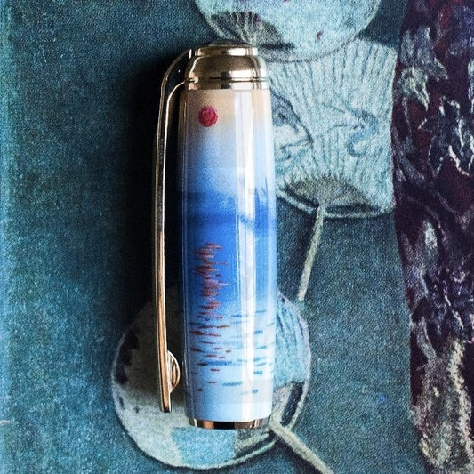 S.T. Dupont Line D Monet 412049L rollerball pen, lacquered blue-white gradient barrel with Impression Sunrise design, gold-palladium trim