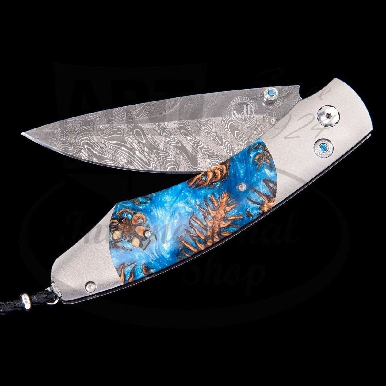 William Henry Spearpoint Woodland titanium frame, acrylic pinecone inlay, Damascus blade, blue topaz accents folding knife
