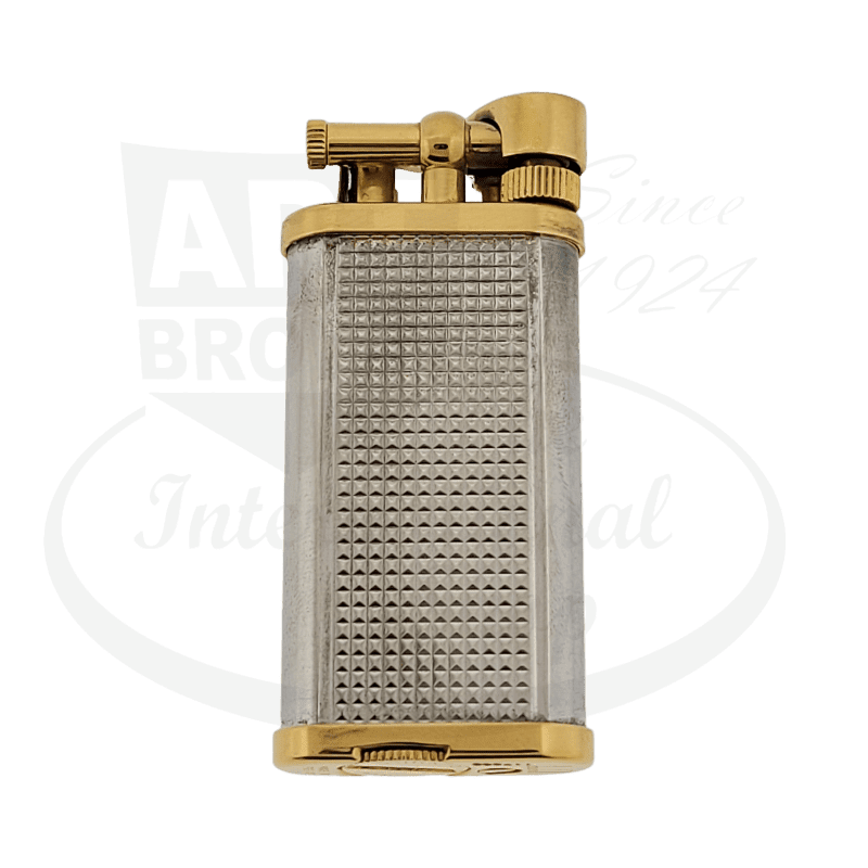 Dunhill Unique Model two-tone brass and silver hammer lighter with textured grid pattern body, gold-plated mechanisms, vintage refurbished condition