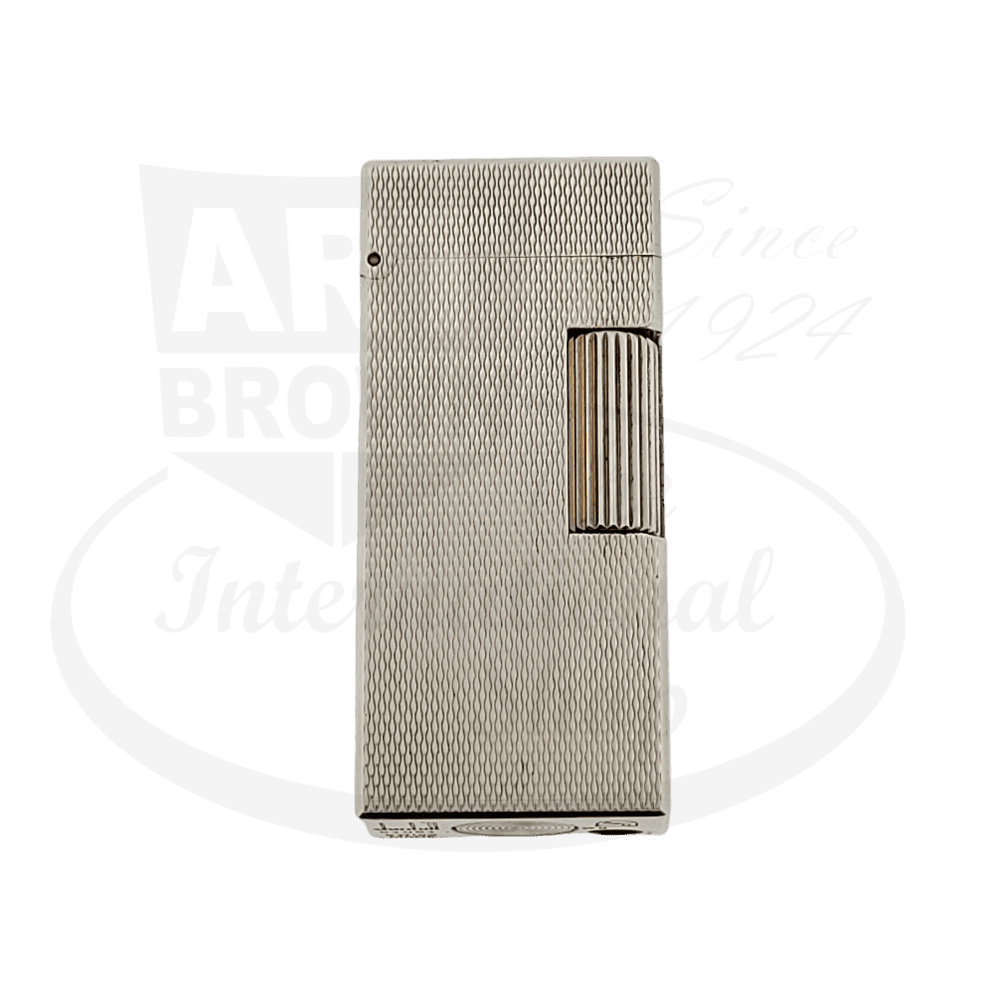 Dunhill Rollagas silver-plated metal lighter with barley grain pattern, featuring vertical ridged texture and side-mounted flint wheel ignition
