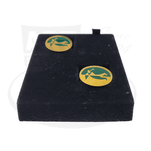 Dunhill Vintage Golf Cufflinks, black enamel and gold vermeil sterling silver, oval shape with golfer motif, displayed on black velvet stand