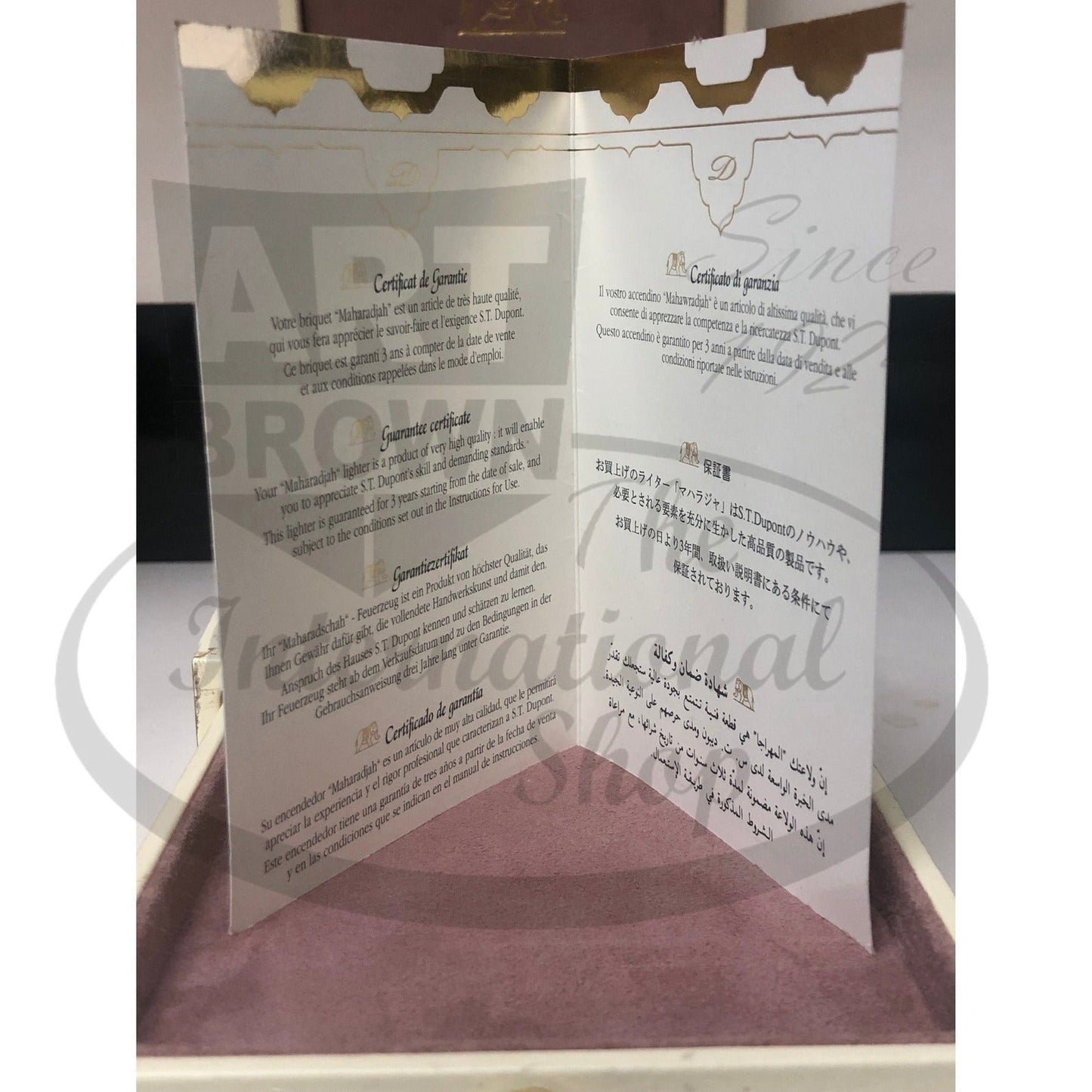 S.T. Dupont Maharadjah Limited Edition pocket lighter instruction booklet in multi-language on velvet tray
