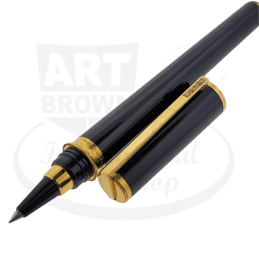 S.T. Dupont Montparnasse black lacquer brass rollerball pen with gold accents and diamond-studded clip, showcasing elegant design and premium craftsmanship
