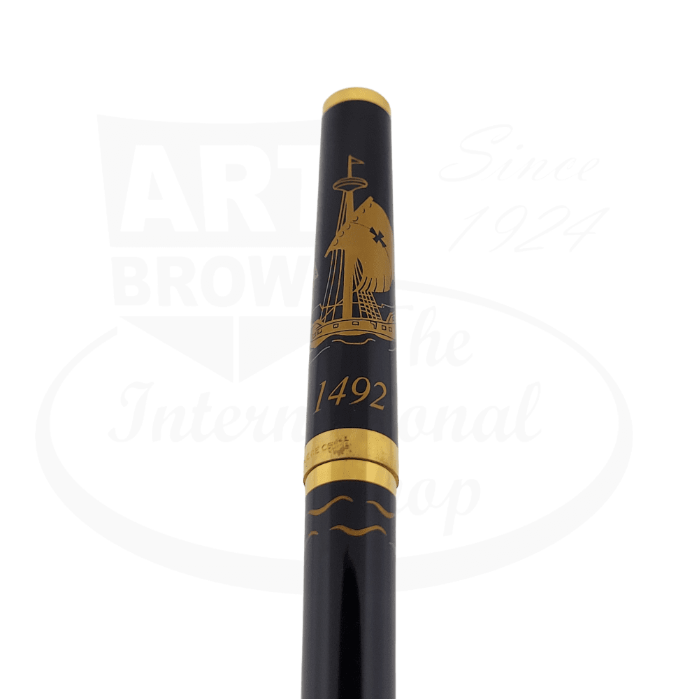 S.T. Dupont Classique 1492 Columbus rollerball pen in black lacquer with gold trim, featuring engraved sailing ship design and numbered 1775/2000
