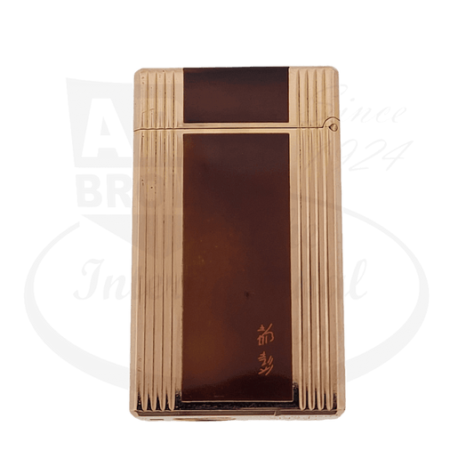 S.T. Dupont Ligne 1 vintage luxury lighter in orange lacquer with gold-plated ribbed frame, rectangular design, classic Art Deco styling