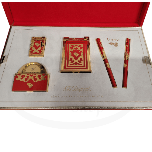 S.T. Dupont Teatro Limited Edition set featuring red Chinese lacquer and gold-plated collection with lighter, pen set, and carriage clock in presentation box