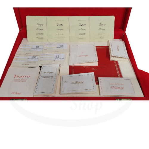 S.T. Dupont Teatro Limited Edition original paperwork collection displayed in red presentation box, featuring warranty cards and authenticity documents #0011