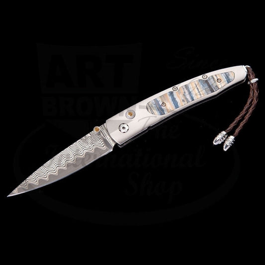 William Henry Lancet Reverso titanium frame with fossil Woolly Mammoth tooth inlay and Wave Damascus blade