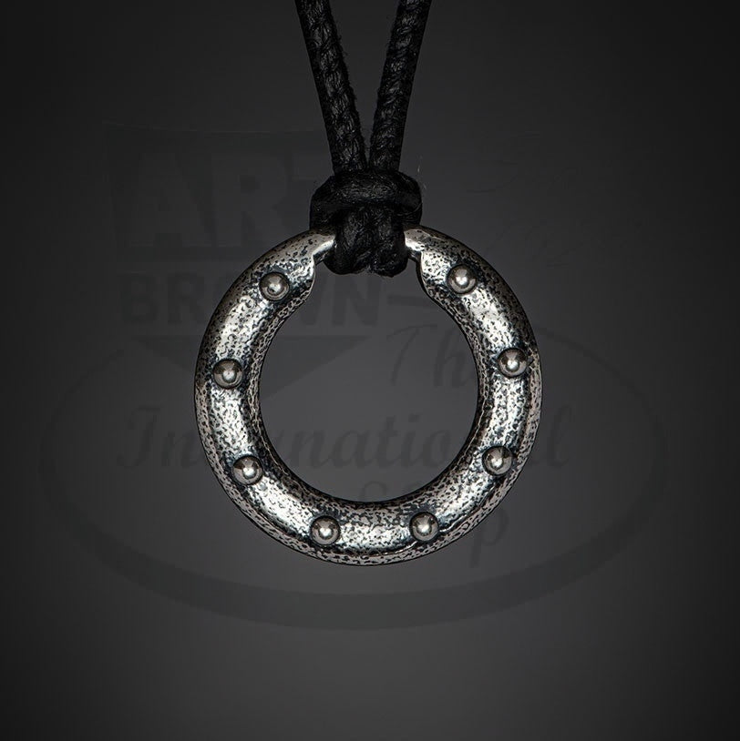 William Henry Silver Orbit sterling silver ring pendant with rivet pattern on black leather cord necklace