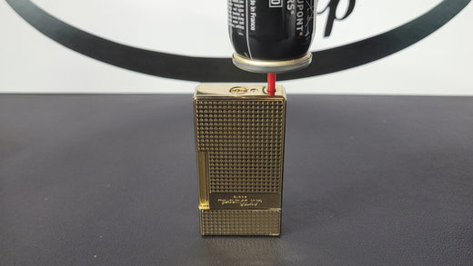 S.T. Dupont biggy lighter being refueled.