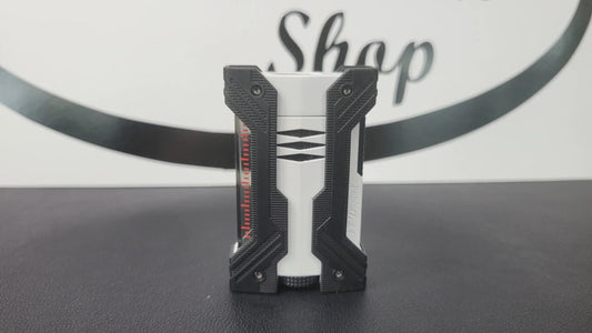 S.T. Dupont Double flame Defi XXtreme lighter in white and black.
