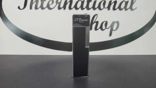 S.T. Dupont Twiggy lighter with black lacquer and chrome finish.