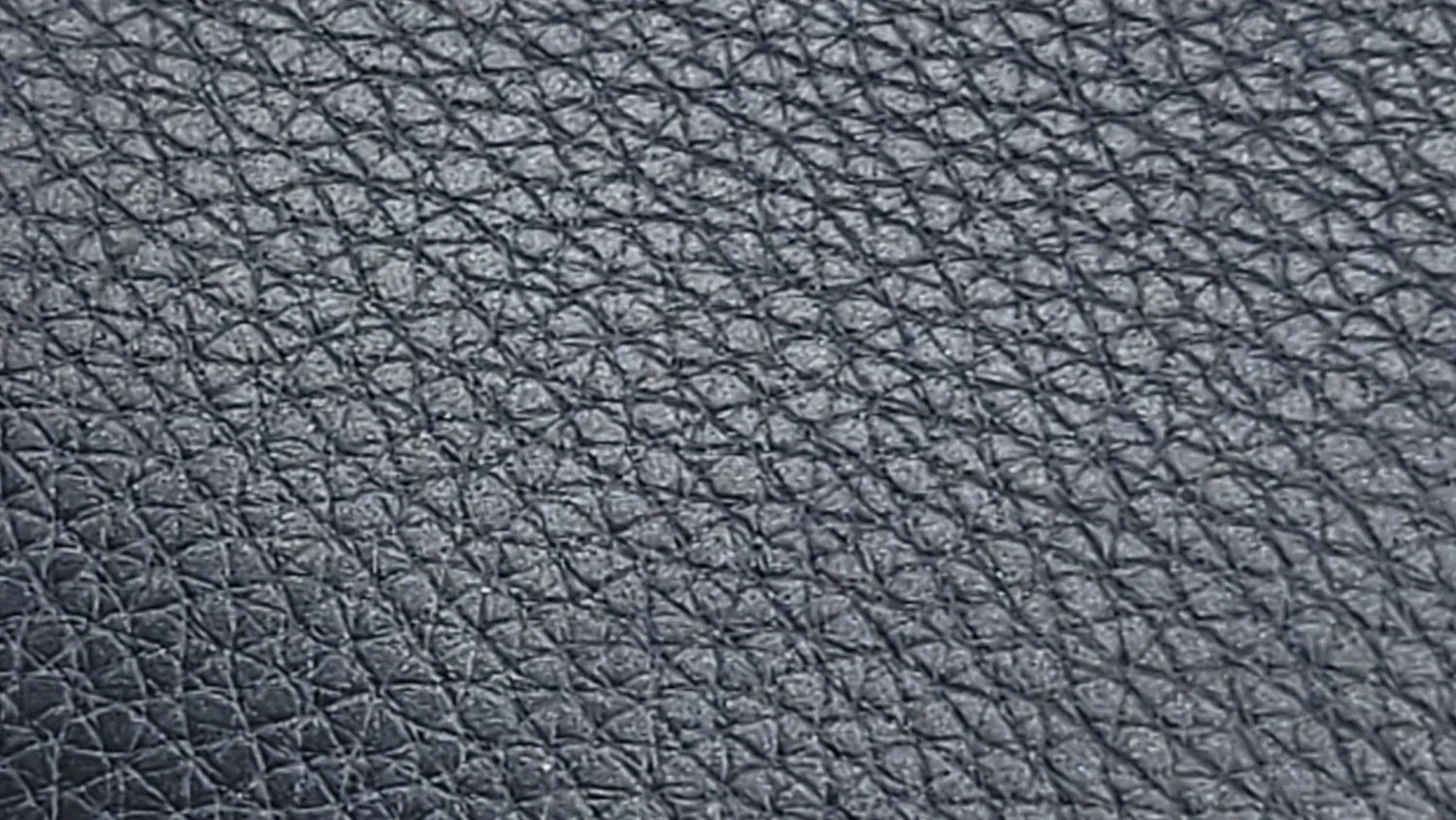 Close up view of blue grained leather from S.T. Dupont wallet