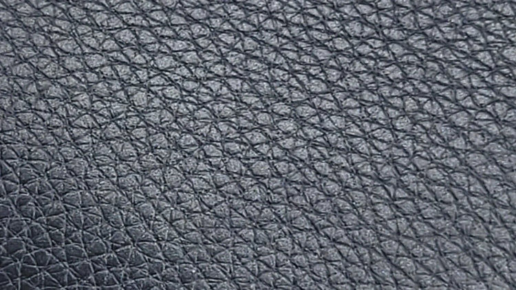 Close up view of blue grained leather from S.T. Dupont wallet