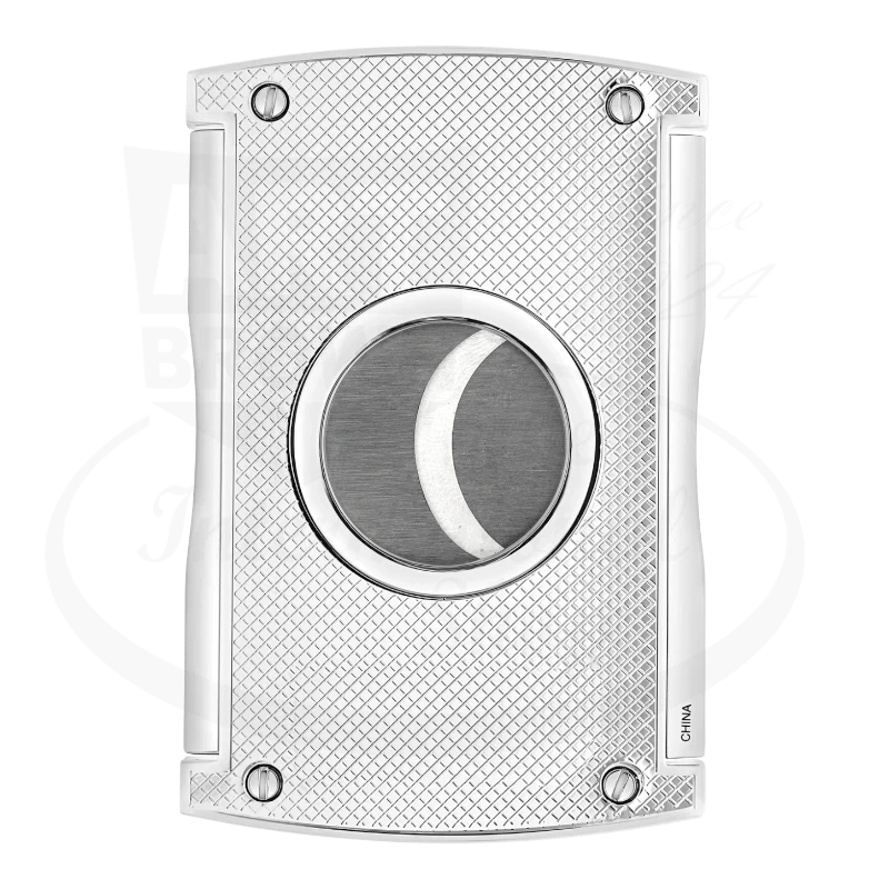 S.T. Dupont dual blade spring mechansim cigar cutter in chrome with gridline pattern, back side of cutter