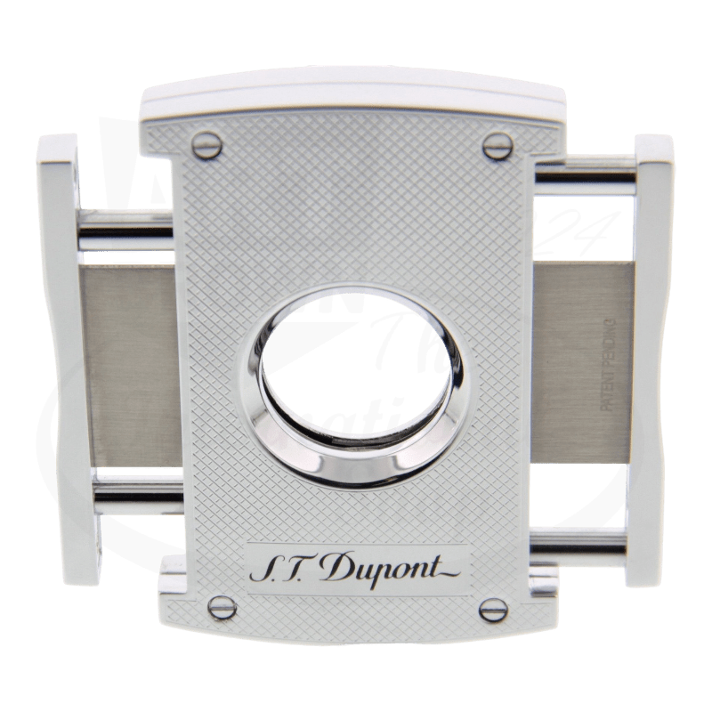 S.T. Dupont dual blade spring mechansim cigar cutter in chrome with gridline pattern with blades open viewed from an angle