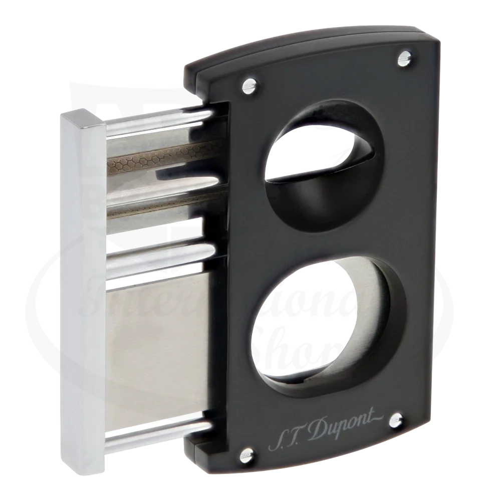 S.T. Dupont spring action double blade cigar cutter with a straight blade a a v-cut blade, blades open