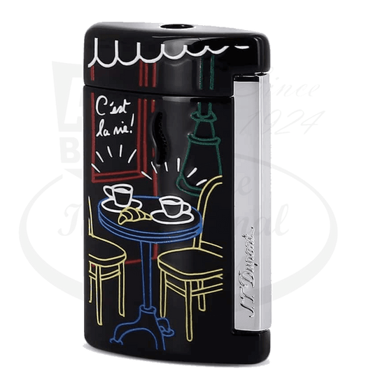 S.T. Dupont Minijet 010540 black lacquer brass lighter featuring Paris bistro scene with Eiffel Tower, cafe table, chairs in colorful neon-style artwork
