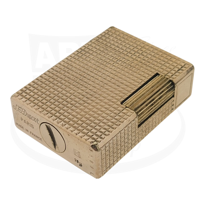 Vintage S.T. Dupont Ligne 1 BS 012110 gold metal lighter with diamond head pattern and engraved details