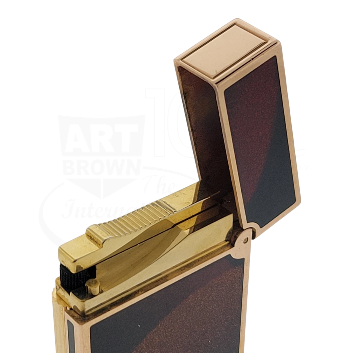 S.T. Dupont Ligne 2 Art Deco lighter open with gold trim and dark lacquer panels