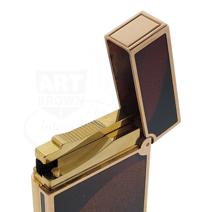S.T. Dupont Ligne 2 Art Deco lighter open with gold trim and dark lacquer panels