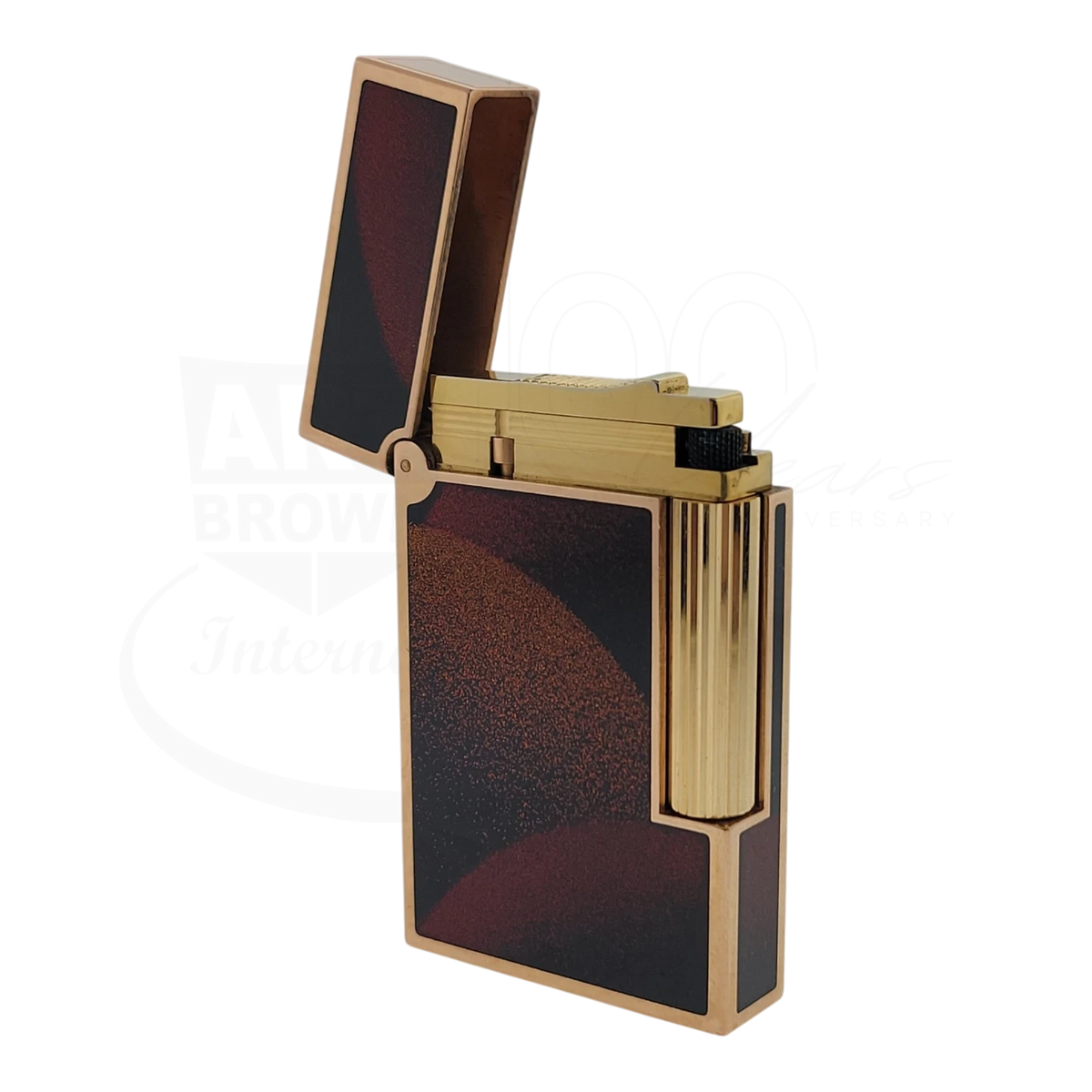S T Dupont Ligne 2 lighter open with Art Deco lacquer panels and gold finish showing the soft flame mechanism