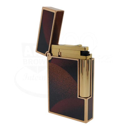 S T Dupont Ligne 2 lighter open with Art Deco lacquer panels and gold finish showing the soft flame mechanism
