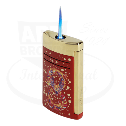 S.T. Dupont Maxijet Dragon 020176 metal lighter in bordeaux and gold with dragon scale guilloche pattern and anime-inspired dragon artwork lit with blue flame