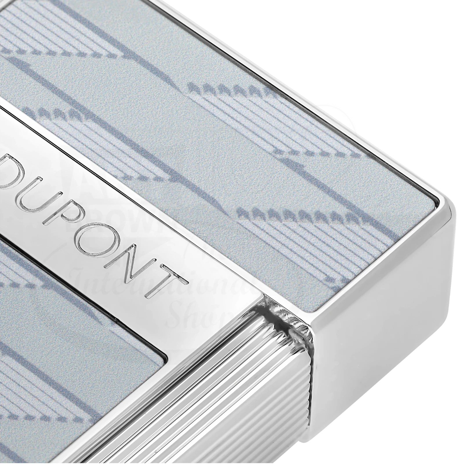 Closeup view of S.T. Dupont Biggy 1872 Monogram lacquered lighter with polished silver trim and grey panels, torch flame