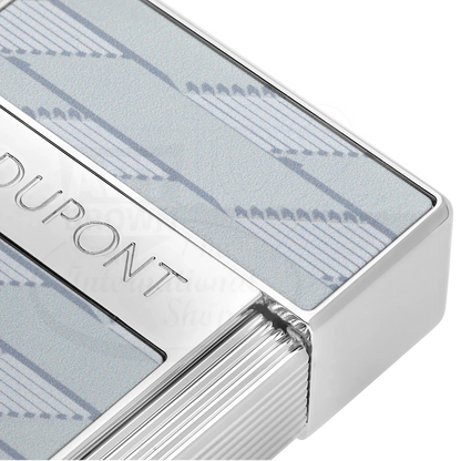 Closeup view of S.T. Dupont Biggy 1872 Monogram lacquered lighter with polished silver trim and grey panels, torch flame