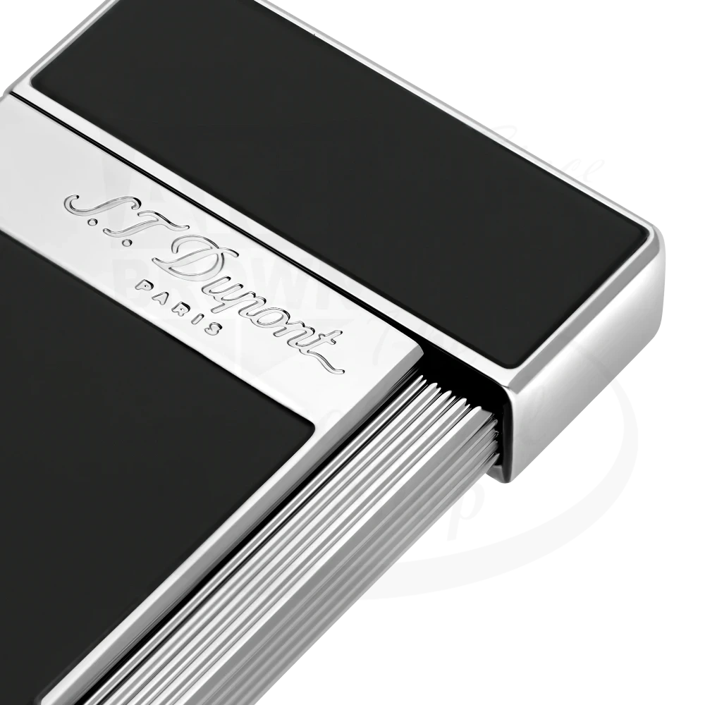 Corner of S.T. Dupont slimmy torch lighter with black lacquer and chrome finish 