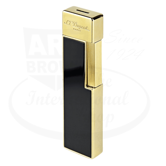 S.T. Dupont Twiggy 030002 luxury lighter in metal and lacquer, featuring shiny black panels with gold-tone trim, slim rectangular design with vertical ridges