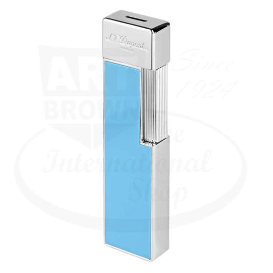 S.T. Dupont Twiggy Shiny Light Blue Lacquer & Chrome Lighter featuring a sleek, vertical design with chrome accents and light blue lacquered finish. Elegant luxury torch lighter with vertical ribbed pattern and polished chrome top displaying the S.T. Dupont logo.