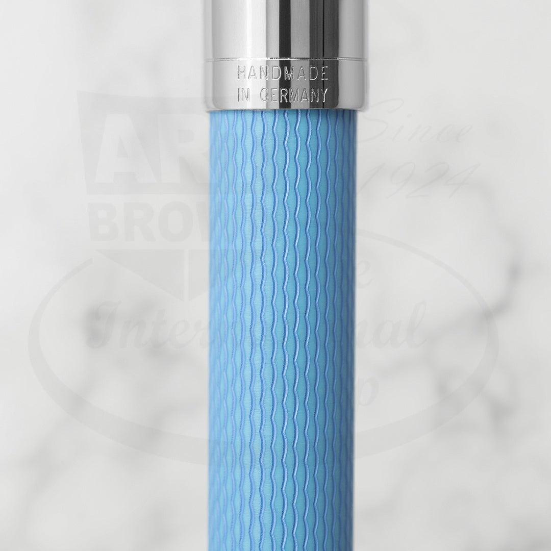 Graf von Faber-Castell Guilloche Blue Gulf fountain pen with engraved resin barrel and silver metal cap close-up