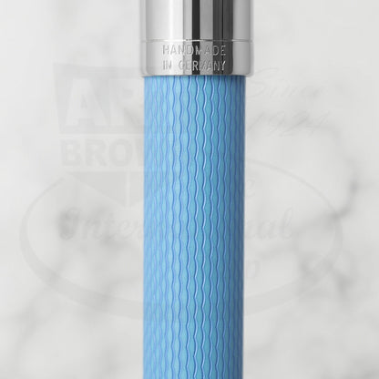 Graf von Faber-Castell Guilloche Blue Gulf fountain pen with engraved resin barrel and silver metal cap close-up