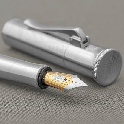 Graf von Faber-Castell Classic Platinum-Plated Fountain Pen with gold and silver nib, sleek metallic silver barrel and cap