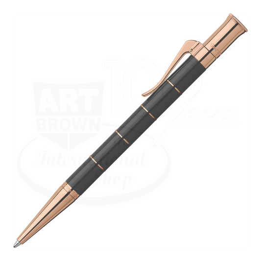 Graf von Faber-Castell Anello ballpoint pen in black resin with rose gold accents shown diagonally