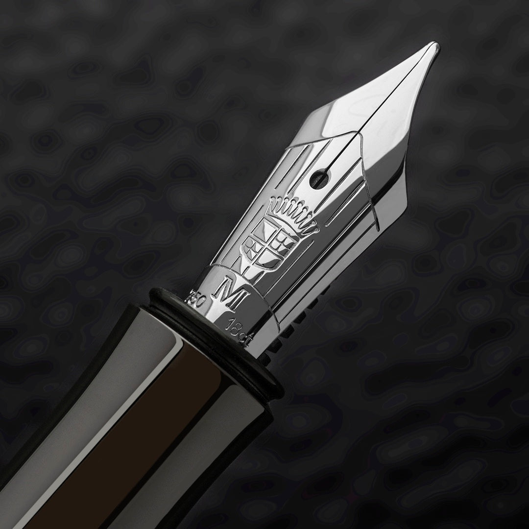 Graf von Faber-Castell Classic Macassar fountain pen nib with detailed engraving and polished silver finish close-up