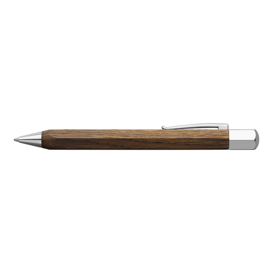 Elegant ballpoint pen with smoked oak barrel and polished silver accents for a refined writing experience