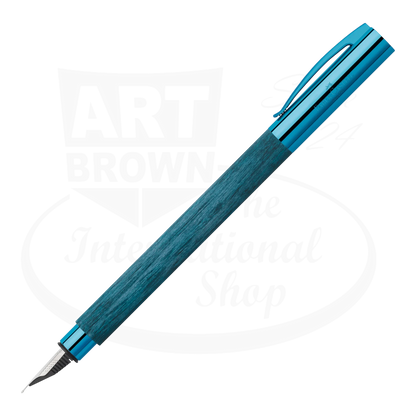 Faber-Castell Ambition Blue Wood Fountain Pen with polished chrome accents and deep blue stained hornbeam wood barrel