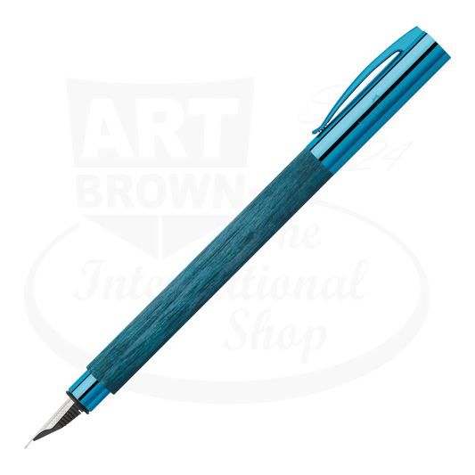 Faber-Castell Ambition Blue Wood Fountain Pen with polished chrome accents and deep blue stained hornbeam wood barrel
